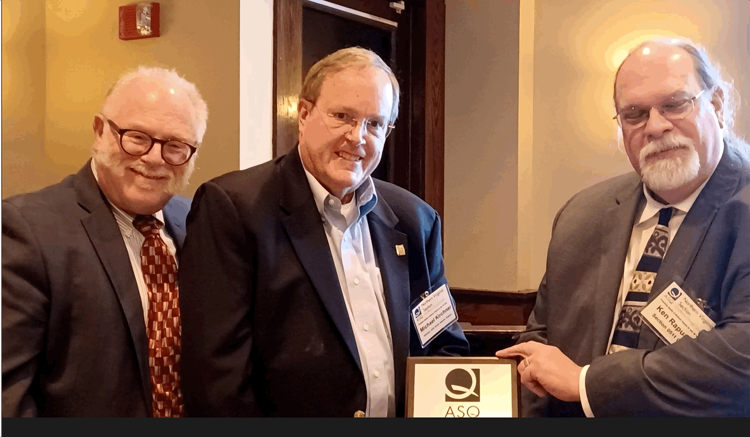 Region 5 Chair Michael Kirchner, with the 40th Anniversary Committee, Jeff Parnes and Kenneth Rapuano, holding the 40th Anniversary Plaque