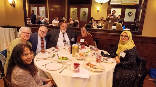 Around a table: Daria and Past Section Chair Jeff Parnes, Section Chair Kenneth and Susan Rapuano, Maria Habib