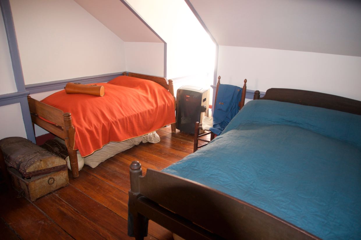 Two beds, with the windows providing the only ventilation