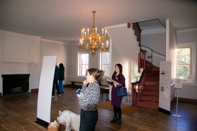 The asse3mbly room with the passgae to the loding quarters up the stairs