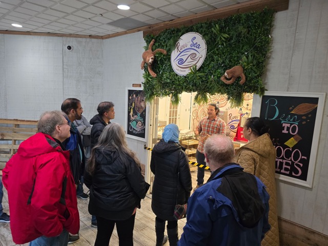 Gathered in front of the chocolate making display 