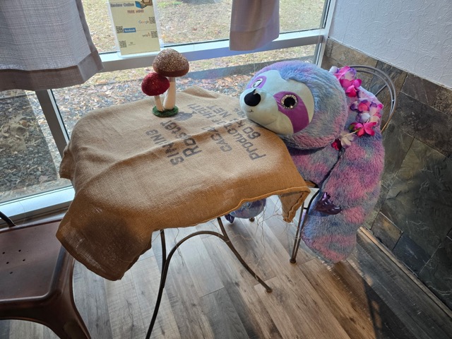 A sloth, the River Sea mascot