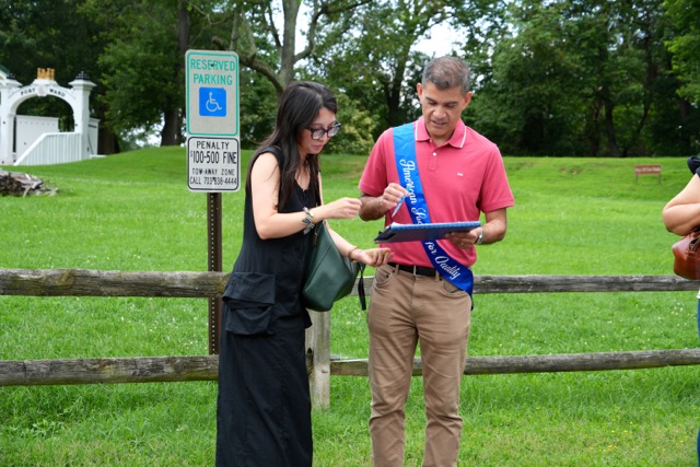 Our Chair-elect, Guoling Chen, checking in with our Ranger Outing Lead, Edwin Videla
